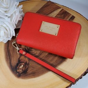 Orange Michael Kors wristlet